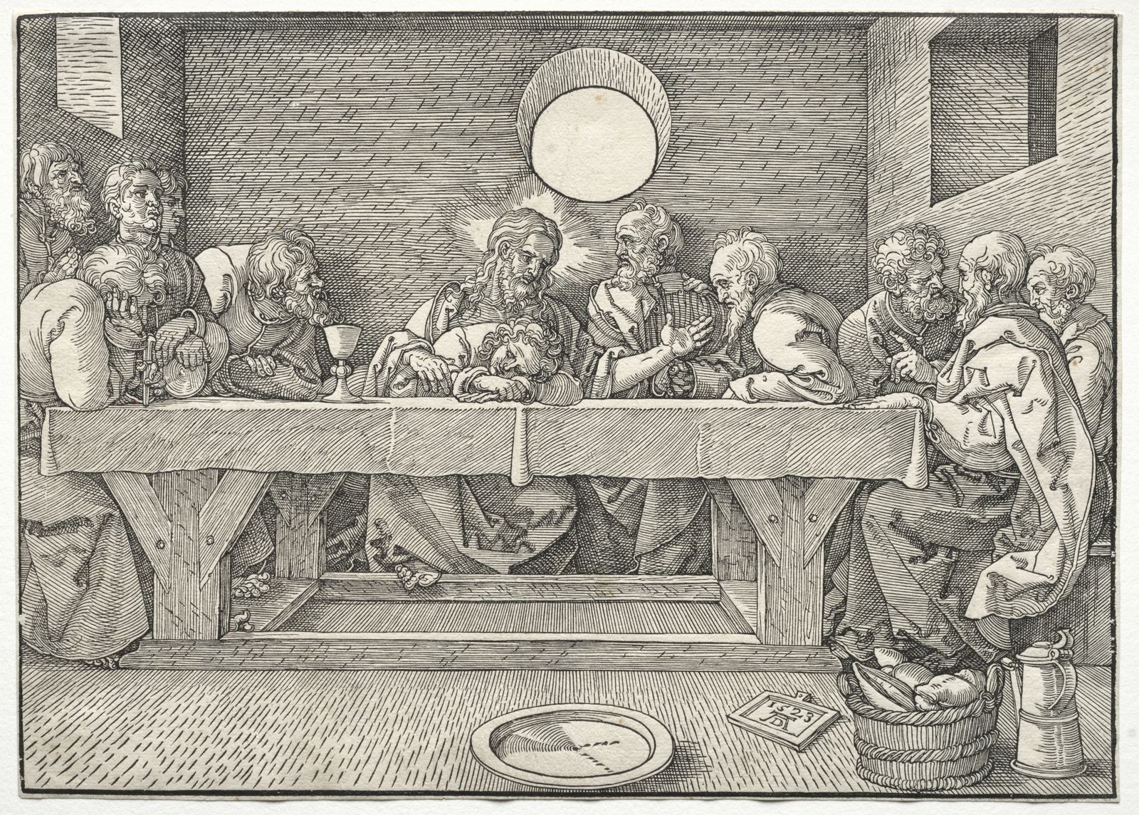 Xilogravura: Cristo e os apóstolos em torno de uma mesa comprida; sobre ela, um cálice; no chão, à direita, um cesto com pão.